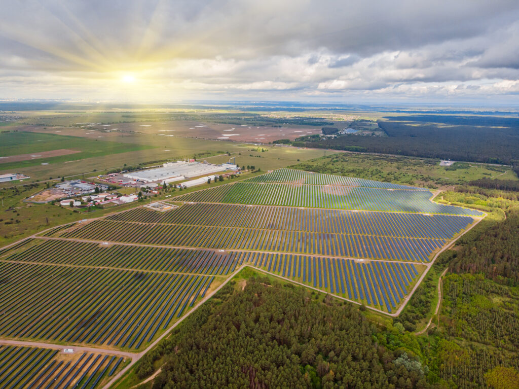 solar power plant in the field. aerial view of solar panels.